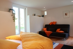 Das bequeme Sofa im Appartement Jaune Appartement Jaune